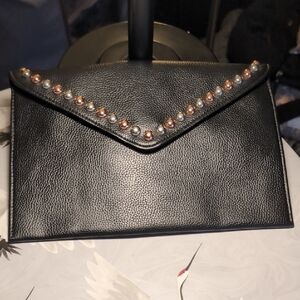 B-Low The Belt Clutch